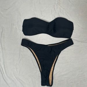 Matthew Bruch two piece black bandeau bikini with high cut bottoms